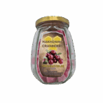 Zoete cranberry honing snoepjes in een glazen pot, gemaakt door Taranartos met natuurlijke ingrediënten zoals honing en cranberry, ideaal voor liefhebbers van gezonde zoetigheden.