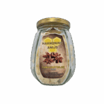 Geurige anijs honing in glazen pot, natuurlijk en ambachtelijk bereid, ideaal voor koken en bakken, met authentieke smaak en aroma, aangeboden door Taranartos.