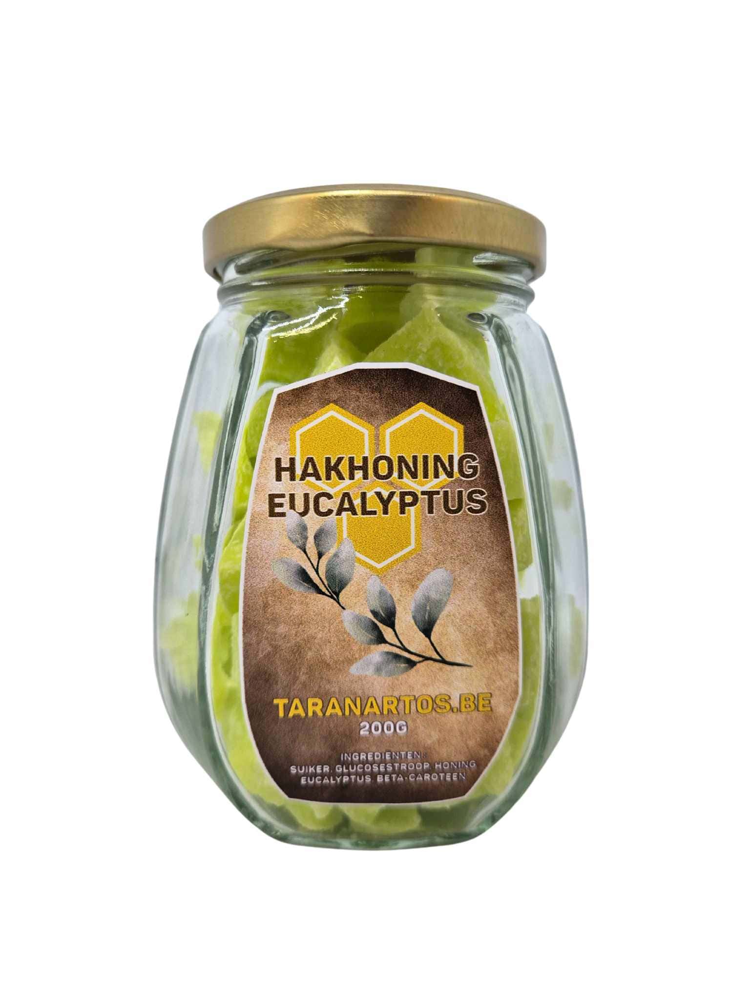 Munt eucalyptus in een glazen pot met goudkleurige deksel, aangeleverd door Taranartos, ideaal voor honing en natuurlijke remedies.