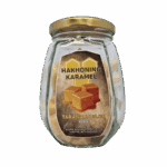 Honing karamelsnoep in glazen pot, ideaal als zoete snack of cadeau, gemaakt door Taranartos met natuurlijke ingrediënten zoals honing, suiker en caroteen.