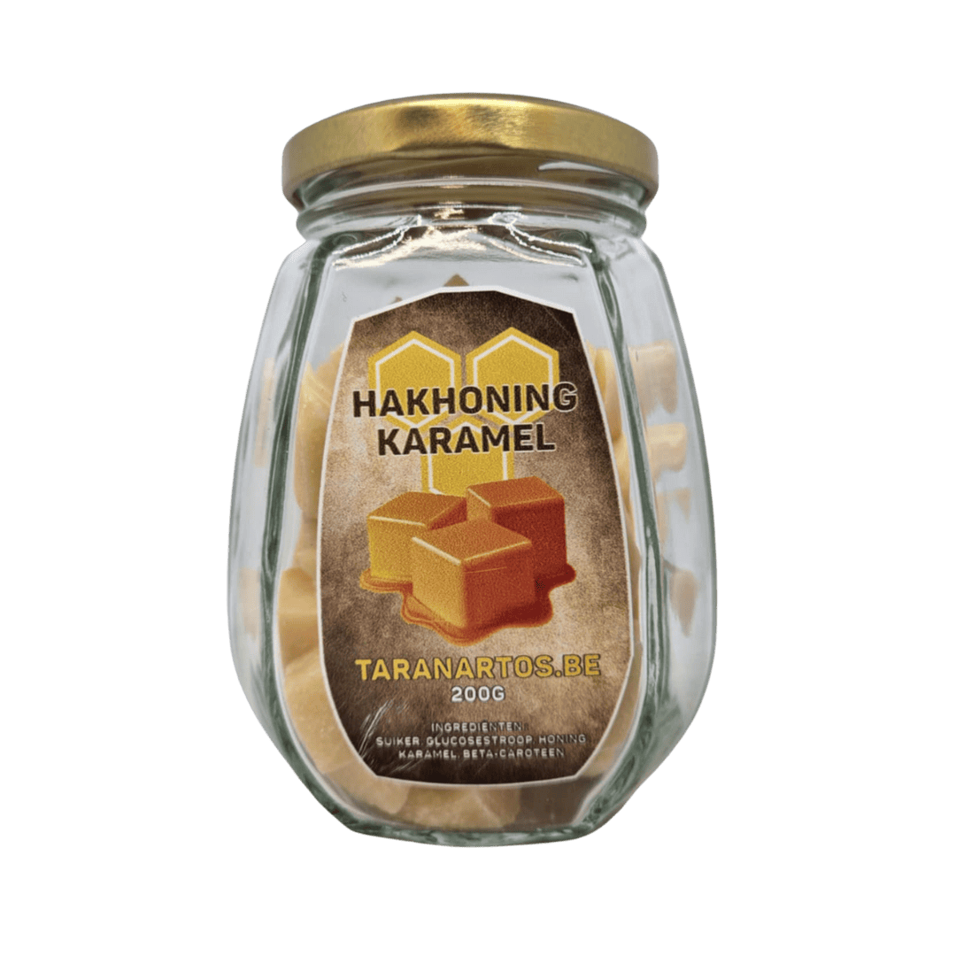 Honing karamelsnoep in glazen pot, ideaal als zoete snack of cadeau, gemaakt door Taranartos met natuurlijke ingrediënten zoals honing, suiker en caroteen.