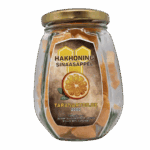 Sinaasappel honing in een glazen pot, natuurlijke zoetstof, gezond en puur, perfect voor ontbijt en koken, van Taranartos.be.