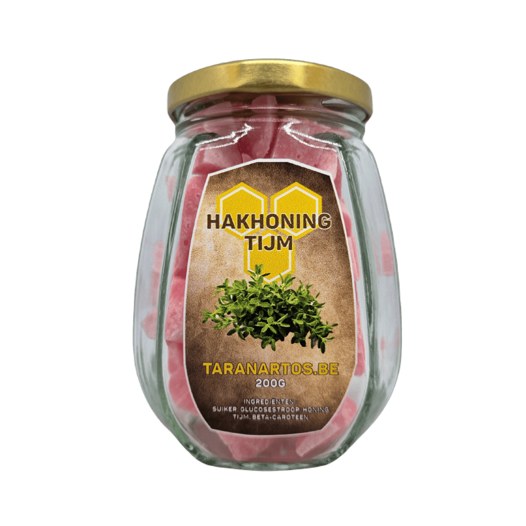 Membraan met honingkruiden en suiker, in glazen potje, geschikt als natuurlijk supplement of traktatie.